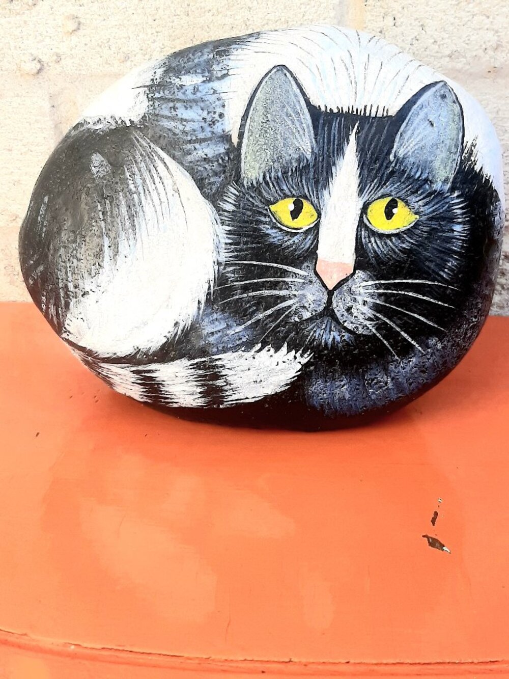 Hand painted folk art kitty on faux stone. Door stop or decor piece.